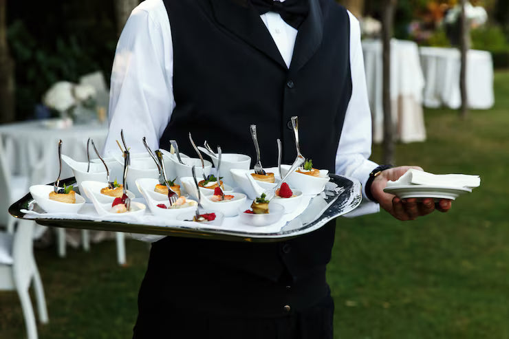 Experienced caterers preparing meals for guests