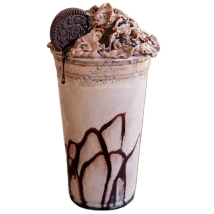 Pistachio icecream shake with cream and nuts topping